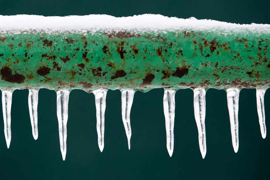 frozen icy down pipe